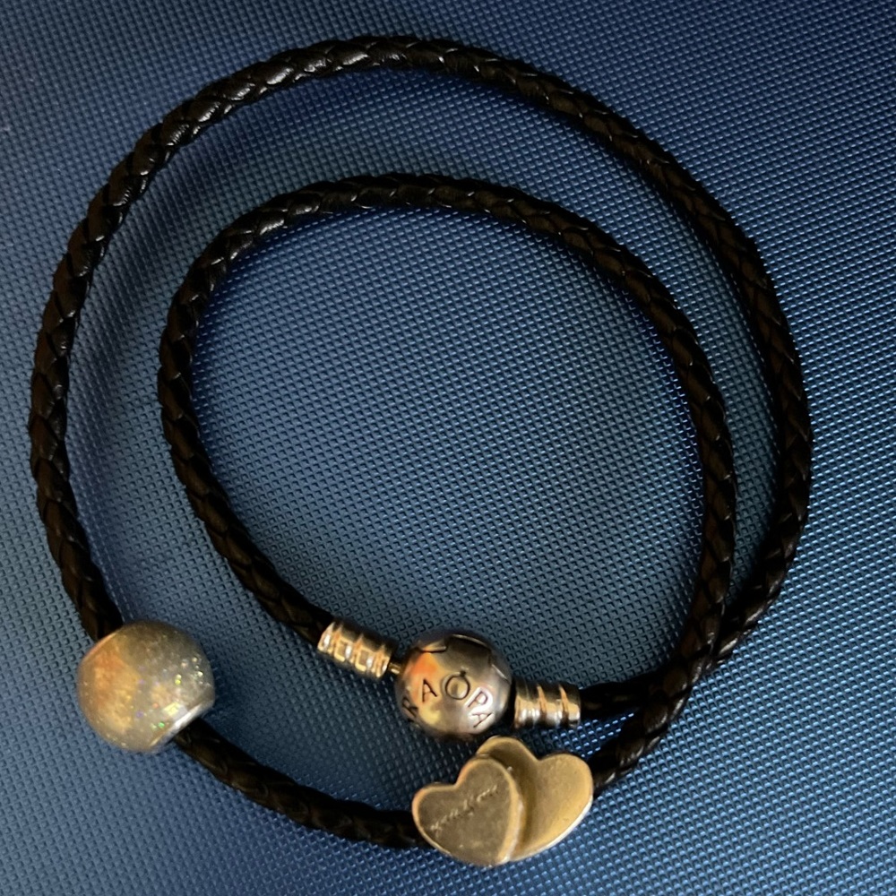 Pandora leather bracelet and charms